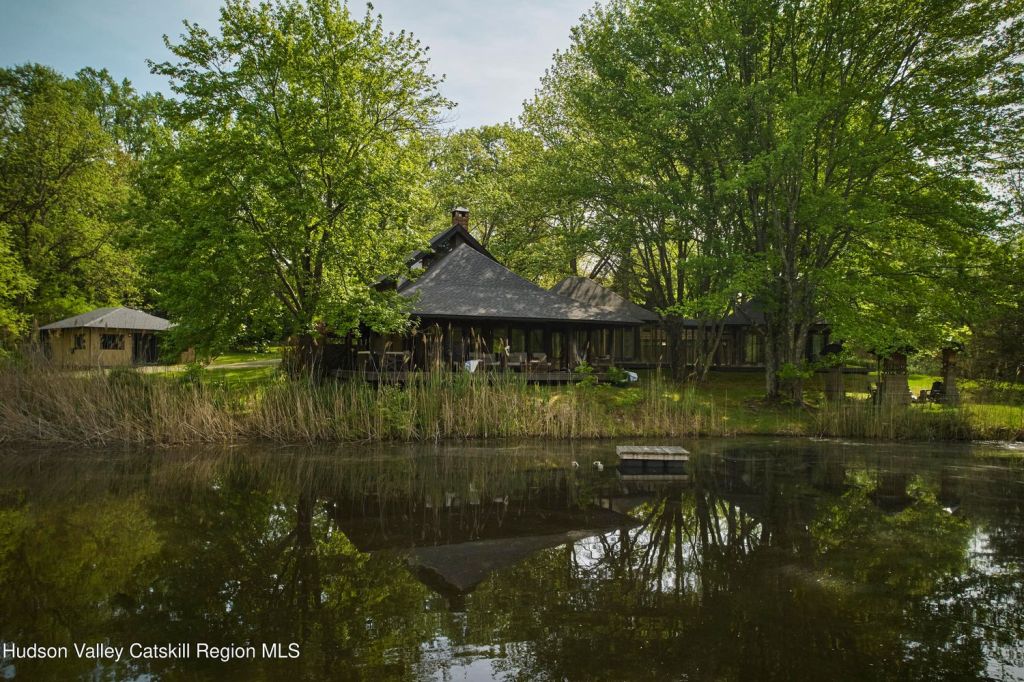 Pond in front of house