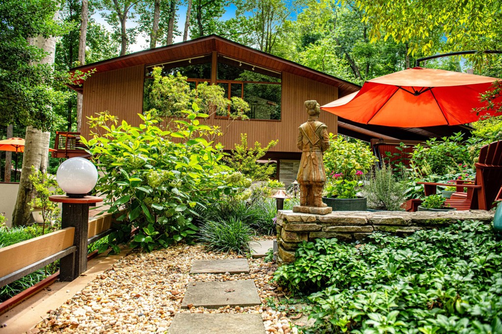 Deck with forest views perfect for nature lovers in Baltimore County with lush gardens