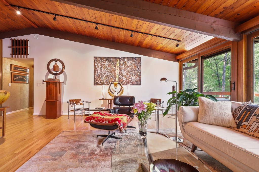 Vaulted ceilings with exposed beams in Maryland deck-style home built in the 1970s