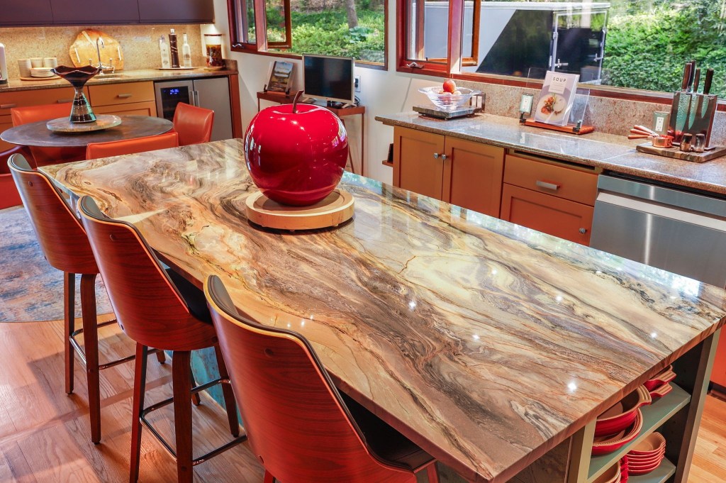 Mid-century retro kitchen with warm cabinetry and natural wood tones and clerestory windows in Baltimore Maryland
