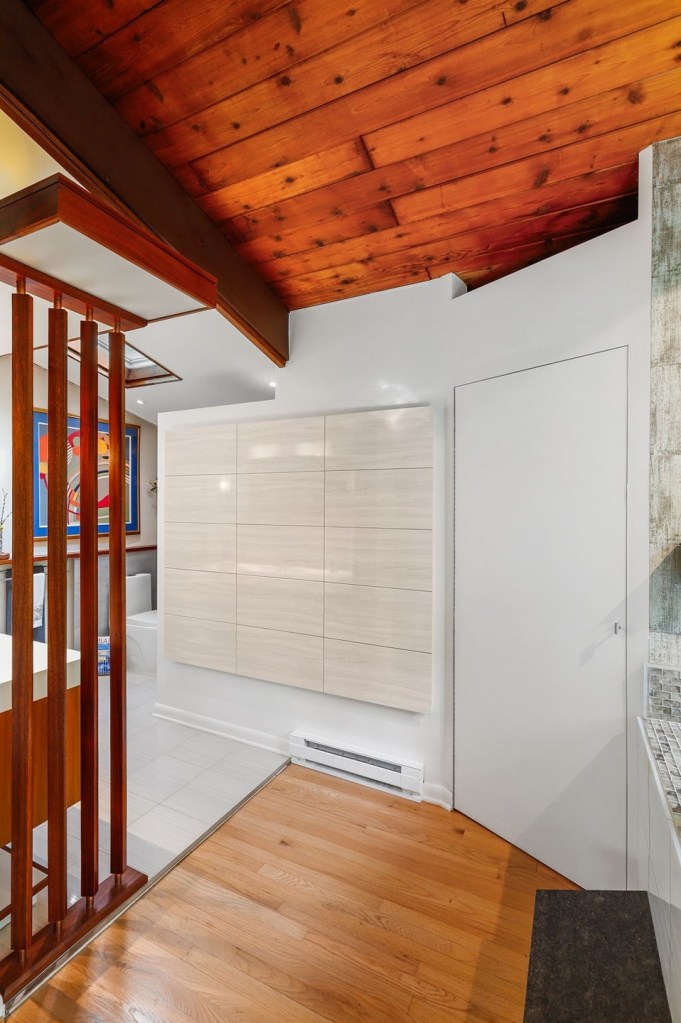 Vintage mid-century bathroom with wood slat divider