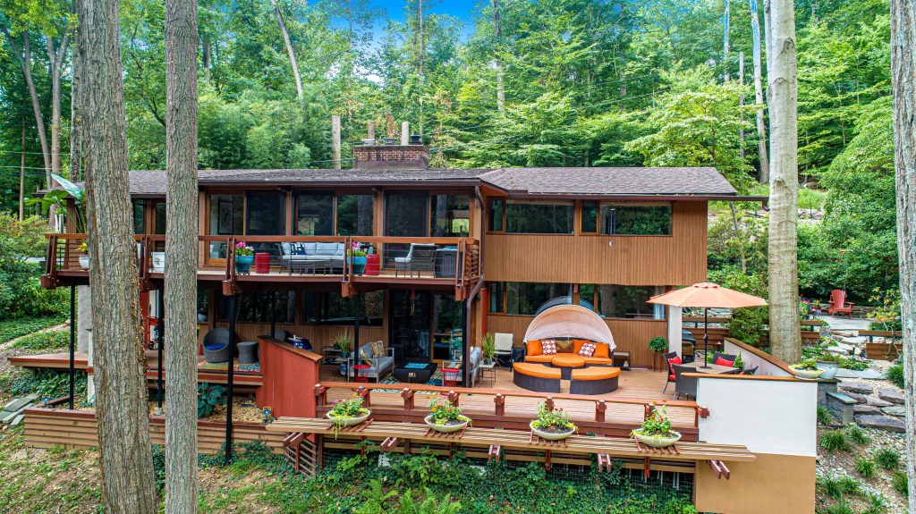 Classic Acorn Deck House architecture in Maryland with natural wood exterior


