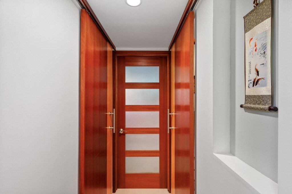 Wooden sliding doors in mid century modern deck house