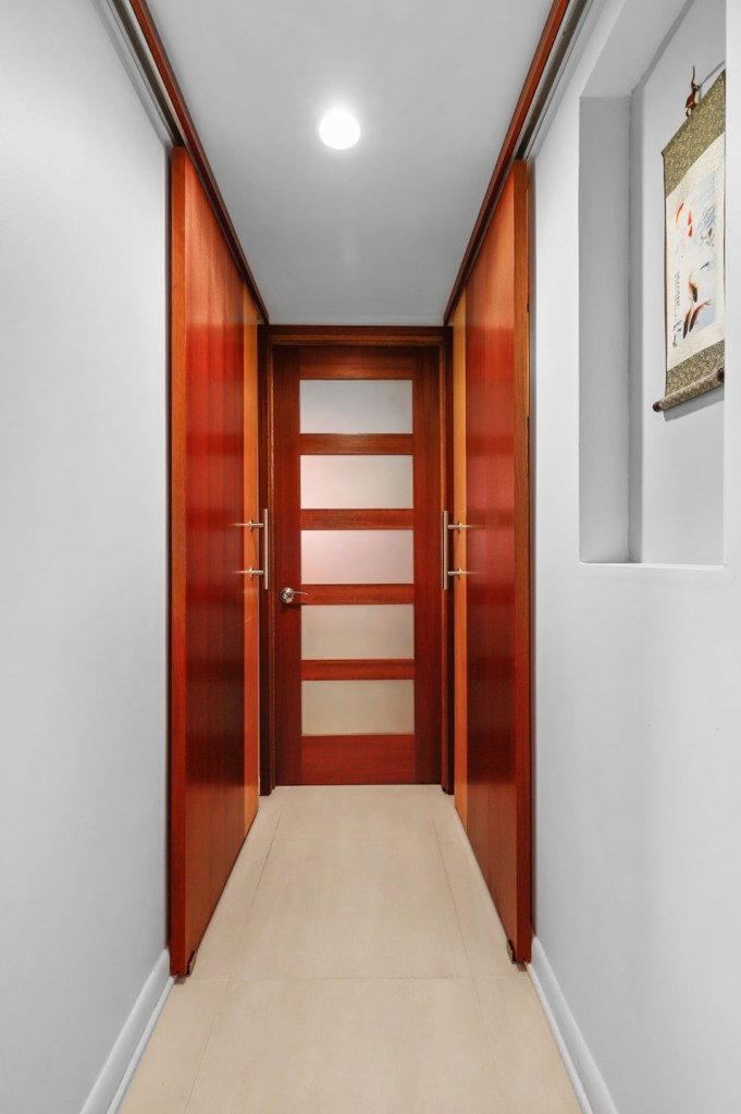 Wooden sliding doors in mid century modern deck house