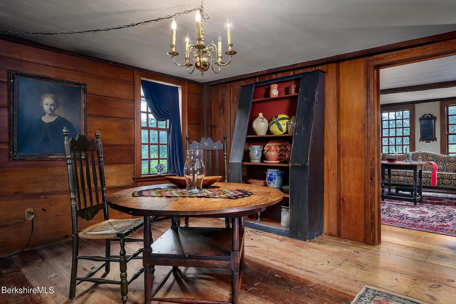 Dining room in restored 18th-century Georgian home in Williamstown Massachusetts with wood floors