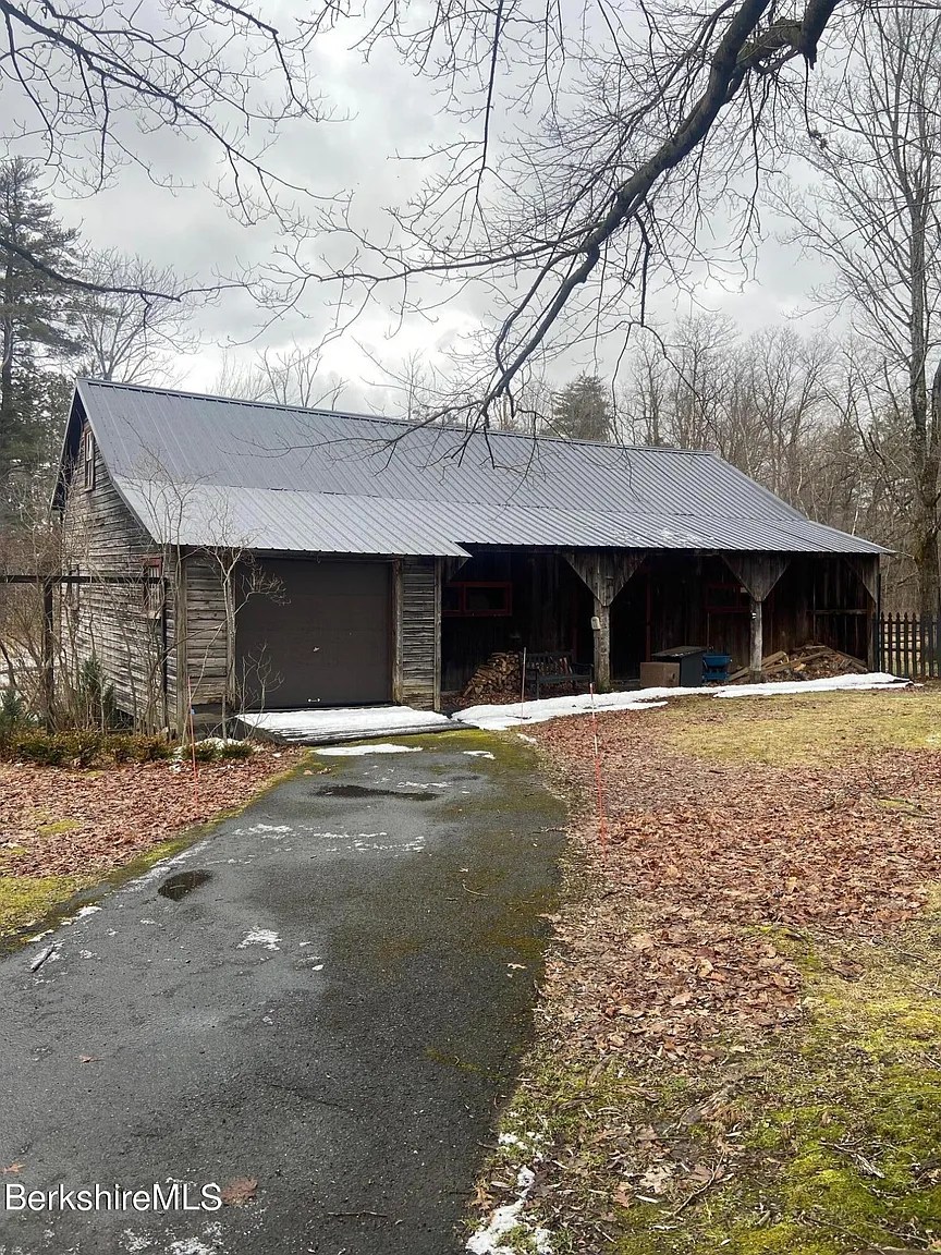 Barn and garage of  restored 18th-century Georgian home in Williamstown Massachusetts