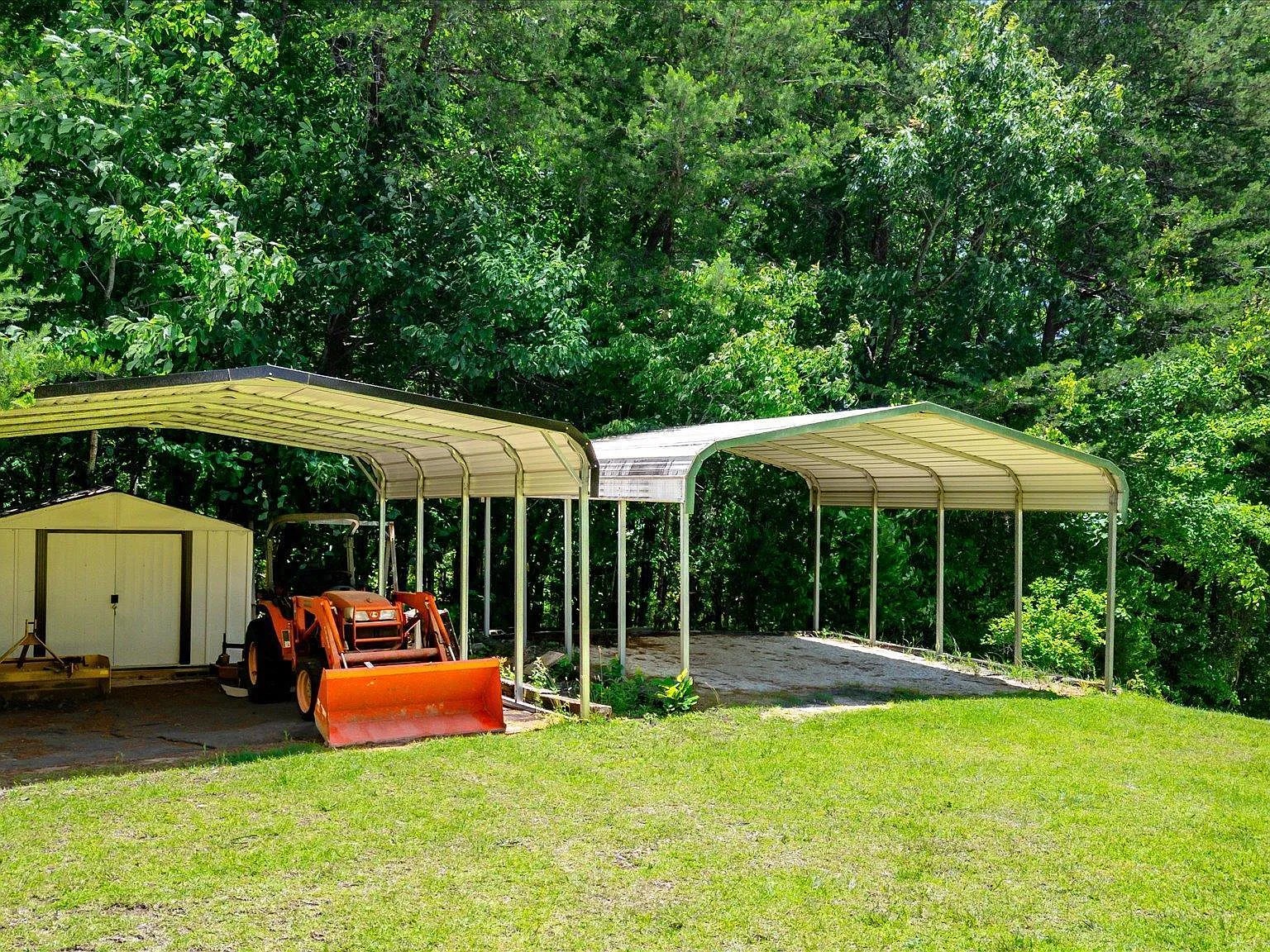 Functional covered area  for storage, workshop, or creative use on five-acre property


