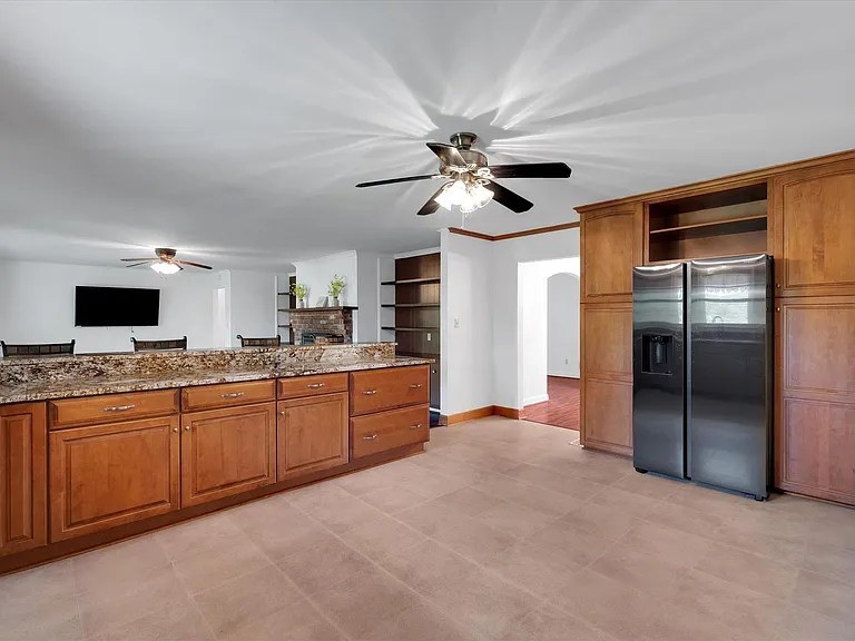 Charming country-style kitchen with wooden cabinetry

