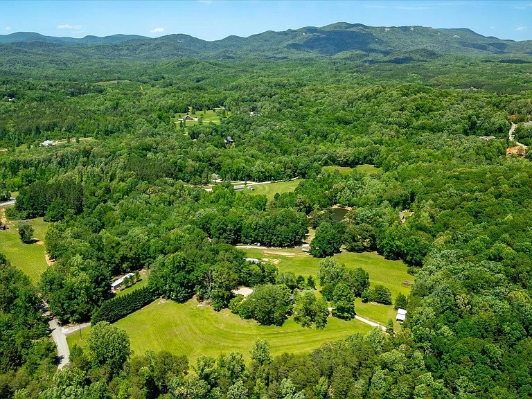 Beautiful view from above of travelers rest house with mountain in the back